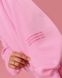 Woman wearing We Rise Oversized Sweater - Pink Rose-We Rise | Model:Bianca | Size:S | Thumbnail Index: 10