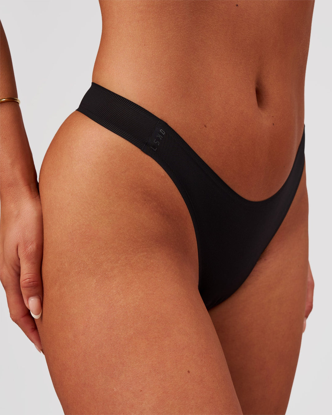 Woman wearing Zero Thong 2pk - Black | Model:Bianca | Size:S - view 9
