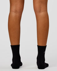 Woman wearing Script Quarter Socks 3 Pack 2.0 - Black-Grey-White | Model:Charli | Size:S