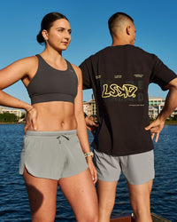 Woman wearing Accelerate Sports Bra - Onyx | Model:Emily | Size:S | Thumbnail Index: 1