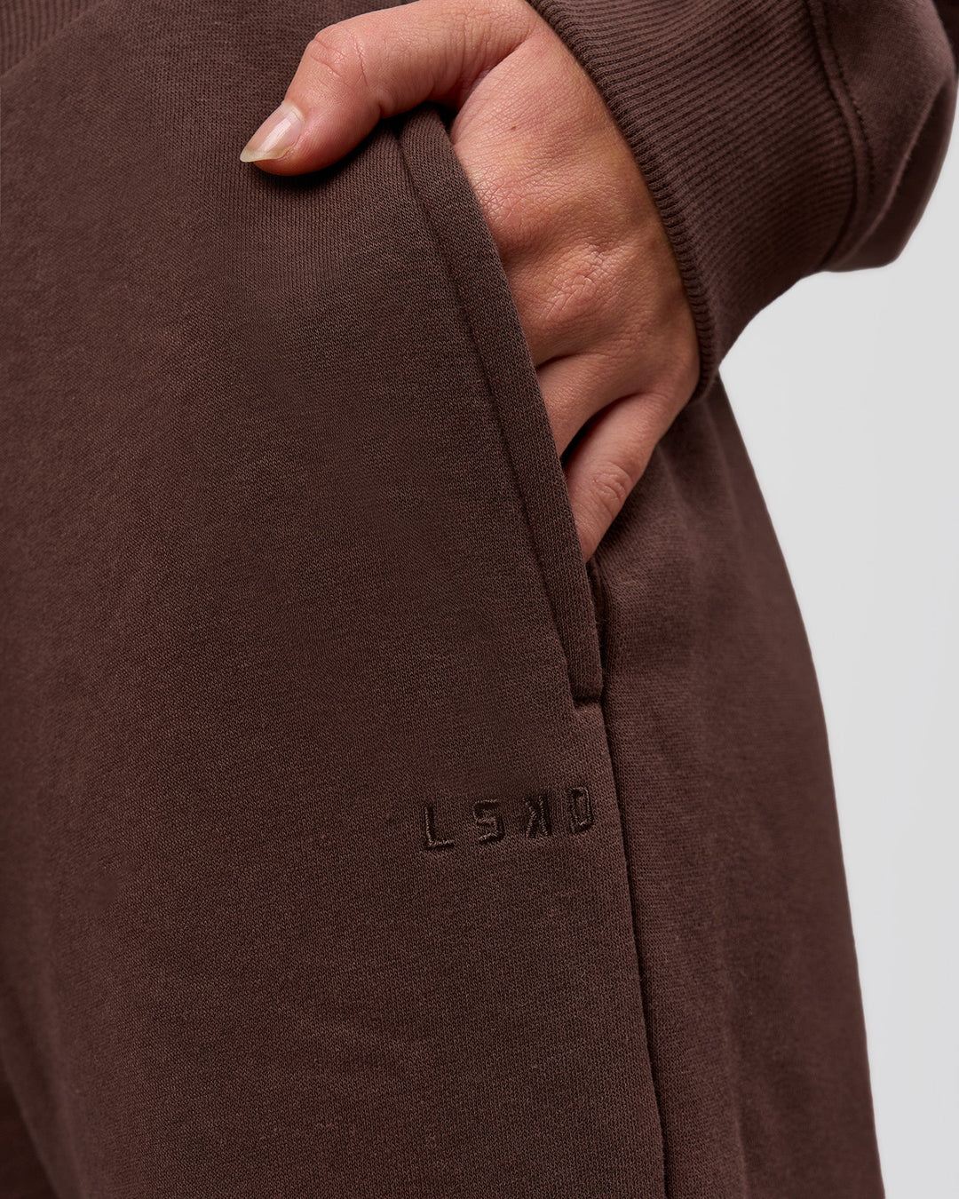 Woman wearing Go-To Wide Leg Track Pant - Hot Chocolate | Model:Issy | Size:S