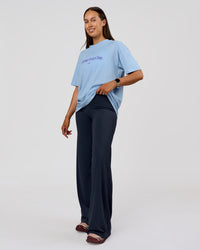 Woman wearing VS6 1% Better Fathers Day FLXCotton Oversized Tee - Open Air | Model:Jess | Size:S | Thumbnail Index: 14