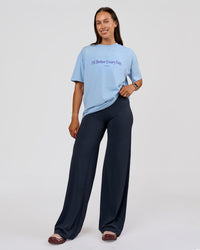 Woman wearing VS6 1% Better Fathers Day FLXCotton Oversized Tee - Open Air | Model:Jess | Size:S | Thumbnail Index: 16