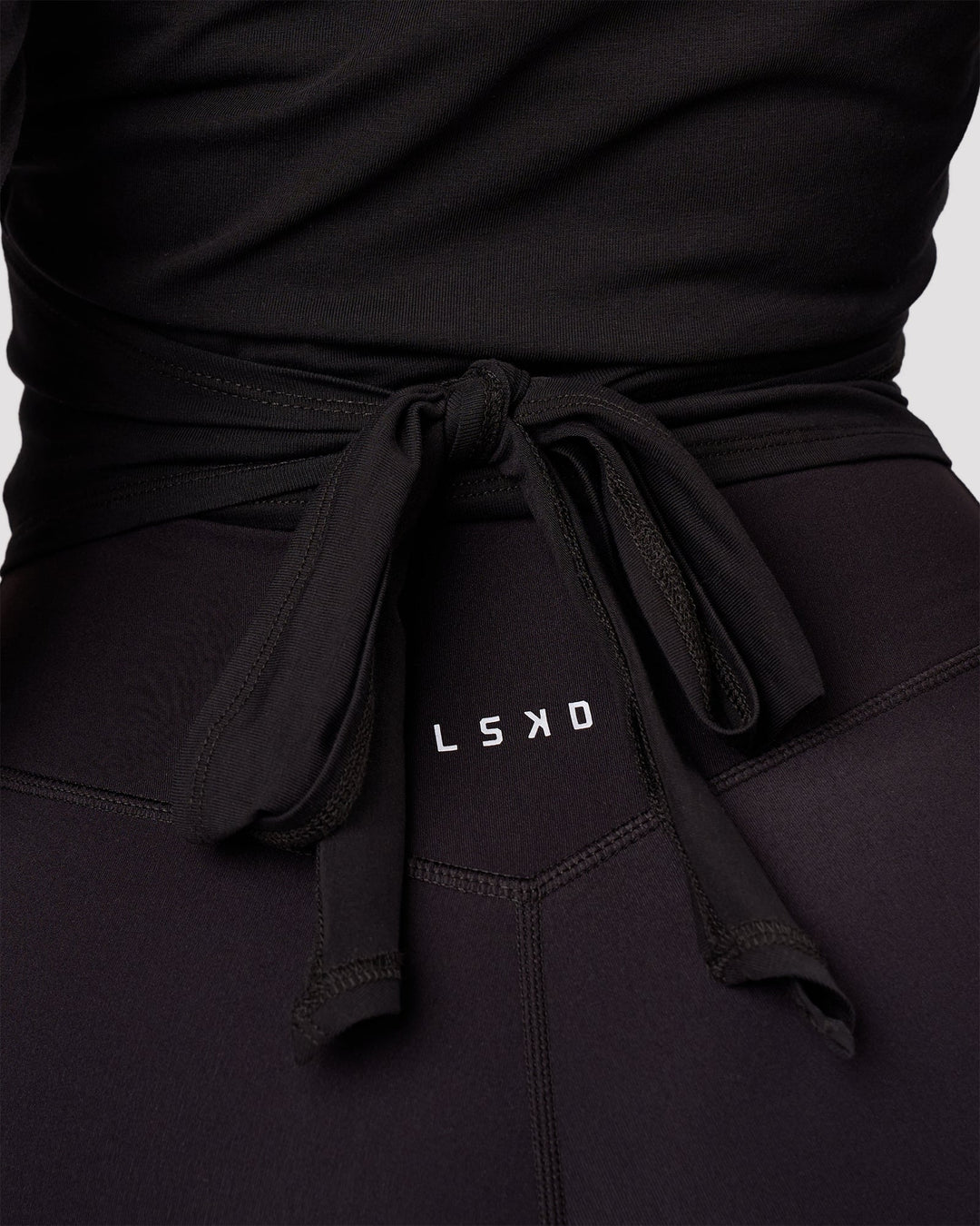 Woman wearing All Day Wrap FLXCotton Long Sleeve Top - Black | Model:Jordan | Size:S - view 6