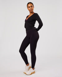 Woman wearing All Day Wrap FLXCotton Long Sleeve Top - Black | Model:Jordan | Size:S | Thumbnail Index: 6