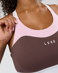Woman wearing Elevated Accelerate Sports Bra - Cocoa Powder-Marshmallow-White | Model:Jordan | Size:S | Thumbnail Index: 3