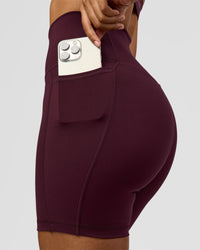Woman wearing Fusion Ultra High-Rise 6" Short Pockets - Cherry Lacquer | Model:Jordan | Size:S | Thumbnail Index: 0