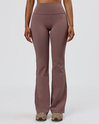 Woman wearing Fusion V-Contour Bind High-Rise Flared Legging - Cocoa Power-White | Model:Jordan | Size:S | Thumbnail Index: 1