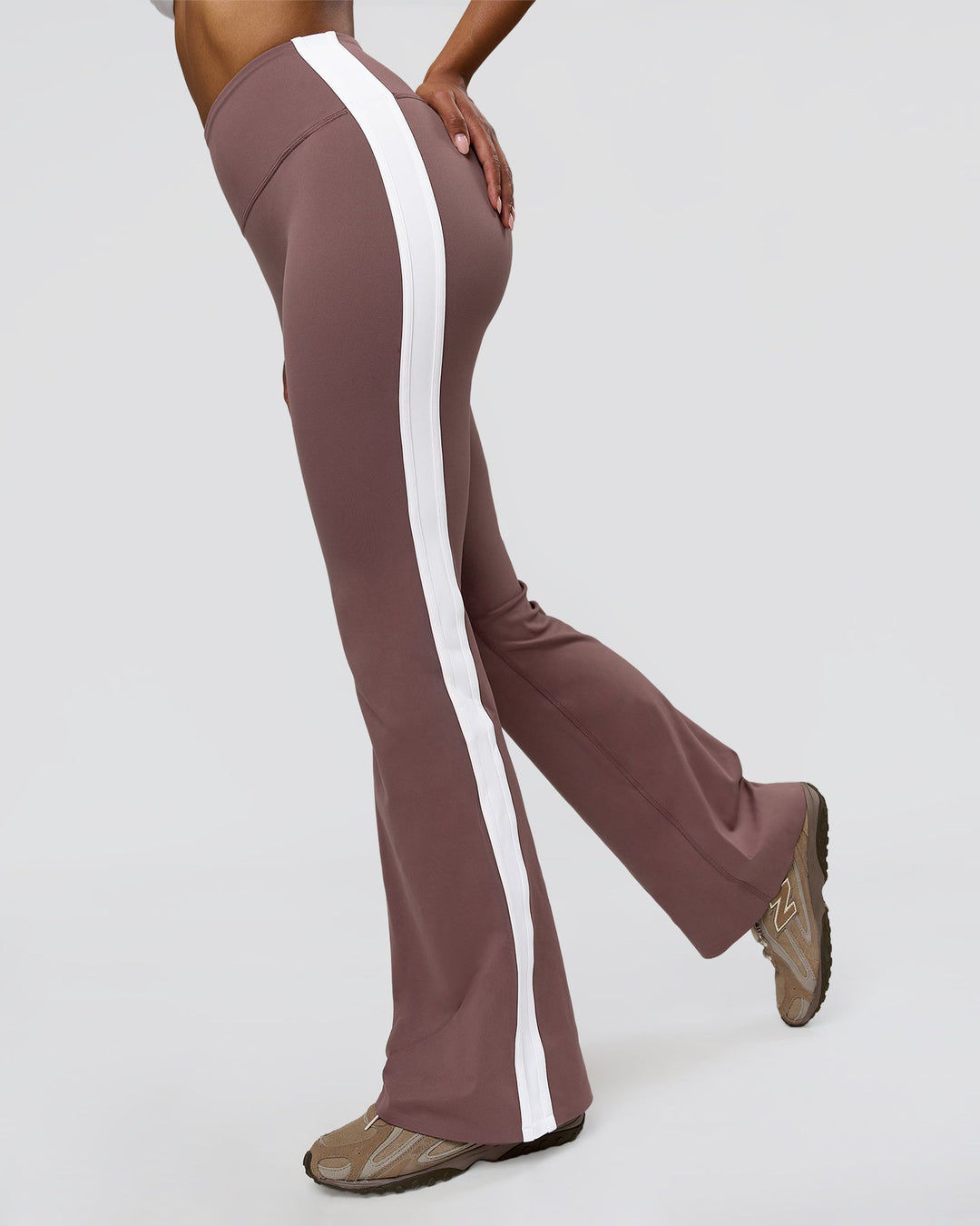 Woman wearing Fusion V-Contour Bind High-Rise Flared Legging - Cocoa Power-White | Model:Jordan | Size:S - view 4