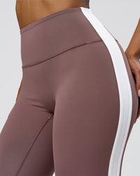 Woman wearing Fusion V-Contour Bind High-Rise Flared Legging - Cocoa Power-White | Model:Jordan | Size:S | Thumbnail Index: 7
