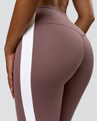 Woman wearing Fusion V-Contour Bind High-Rise Flared Legging - Cocoa Power-White | Model:Jordan | Size:S | Thumbnail Index: 8