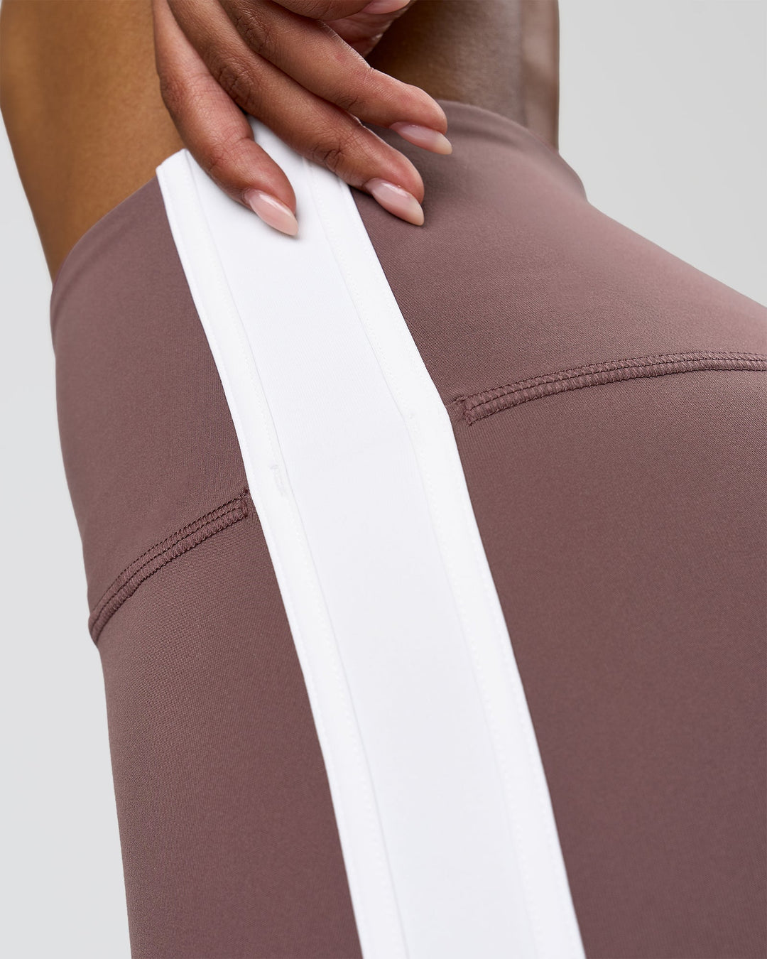 Woman wearing Fusion V-Contour Bind High-Rise Flared Legging - Cocoa Power-White | Model:Jordan | Size:S - view 10