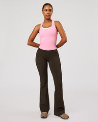 Woman wearing Fusion V-Contour High-Rise Flared Legging Pockets - Ground Coffee | Model:Jordan | Size:S | Thumbnail Index: 5