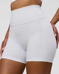 Woman wearing Fusion V-Contour Ultra High-Rise 4" Short Pockets - White | Model:Jordan | Size:S | Thumbnail Index: 2