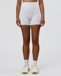 Woman wearing Fusion V-Contour Ultra High-Rise 4" Short Pockets - White | Model:Jordan | Size:S | Thumbnail Index: 5