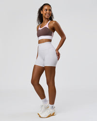 Woman wearing Fusion V-Contour Ultra High-Rise 4" Short Pockets - White | Model:Jordan | Size:S | Thumbnail Index: 6