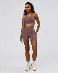 Woman wearing Fusion V-Contour Ultra High-Rise 6" Short Pockets - Cocoa Powder | Model:Jordan | Size:S | Thumbnail Index: 6