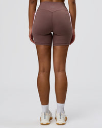 Woman wearing Fusion V-Contour Ultra High-Rise 6" Short Pockets - Cocoa Powder-Marshmallow-White | Model:Jordan | Size:S | Thumbnail Index: 6