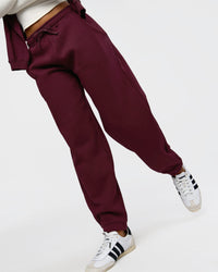 Woman wearing Go-To Oversized Track Pant - Cherry Lacquer | Model:Jordan | Size:S | Thumbnail Index: 1