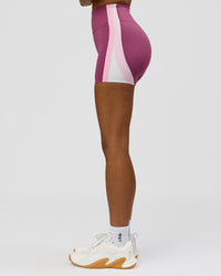 Woman wearing Revitalise Ultra High-Rise 4" Short - Boysenberry - Pink Rose | Model:Jordan | Size:S | Thumbnail Index: 7