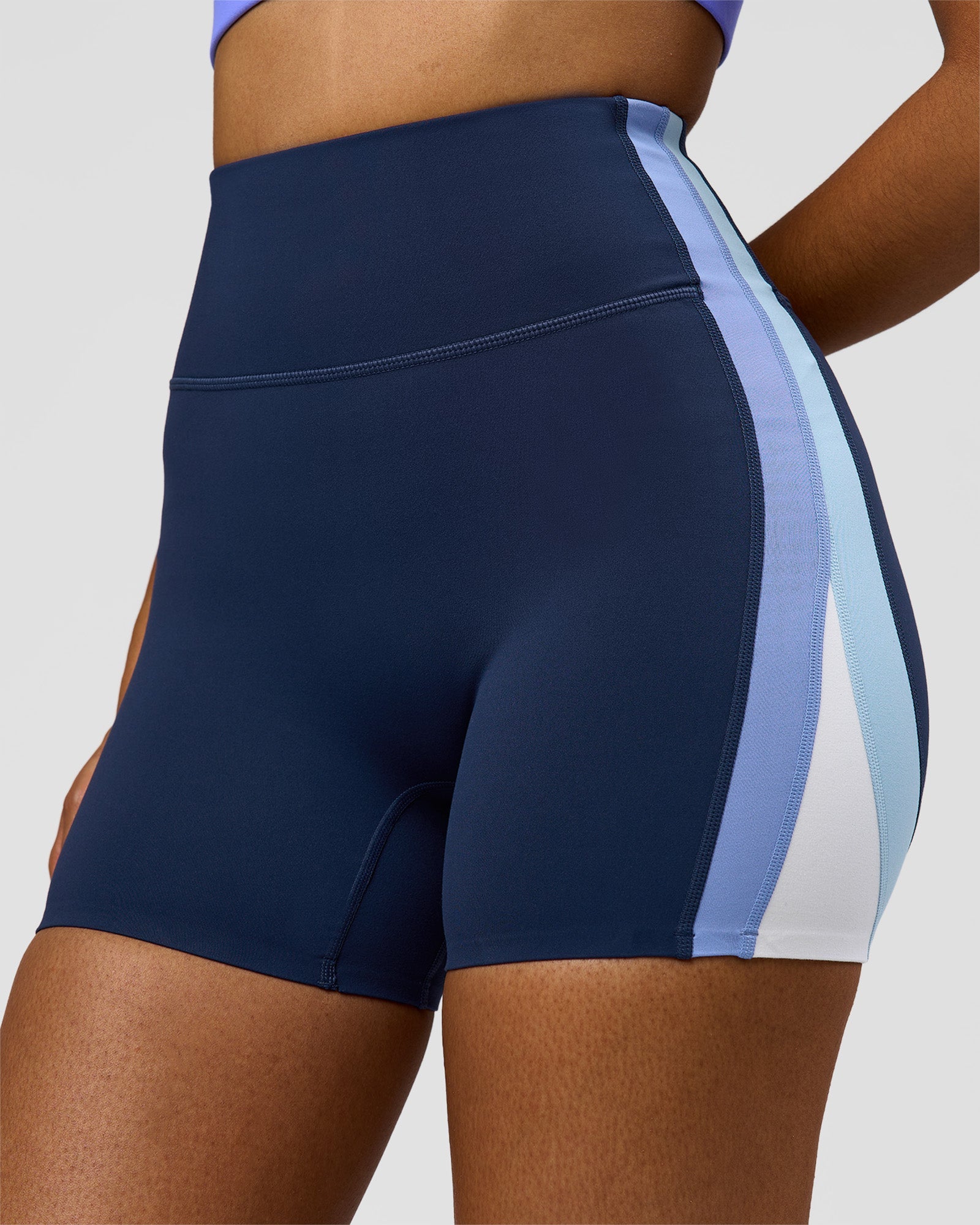 Woman wearing Revitalise Ultra High-Rise 4" Short - Future Navy - Bluebell | Model:Jordan | Size:S