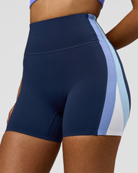 Woman wearing Revitalise Ultra High-Rise 4" Short - Future Navy - Bluebell | Model:Jordan | Size:S | Thumbnail Index: 1
