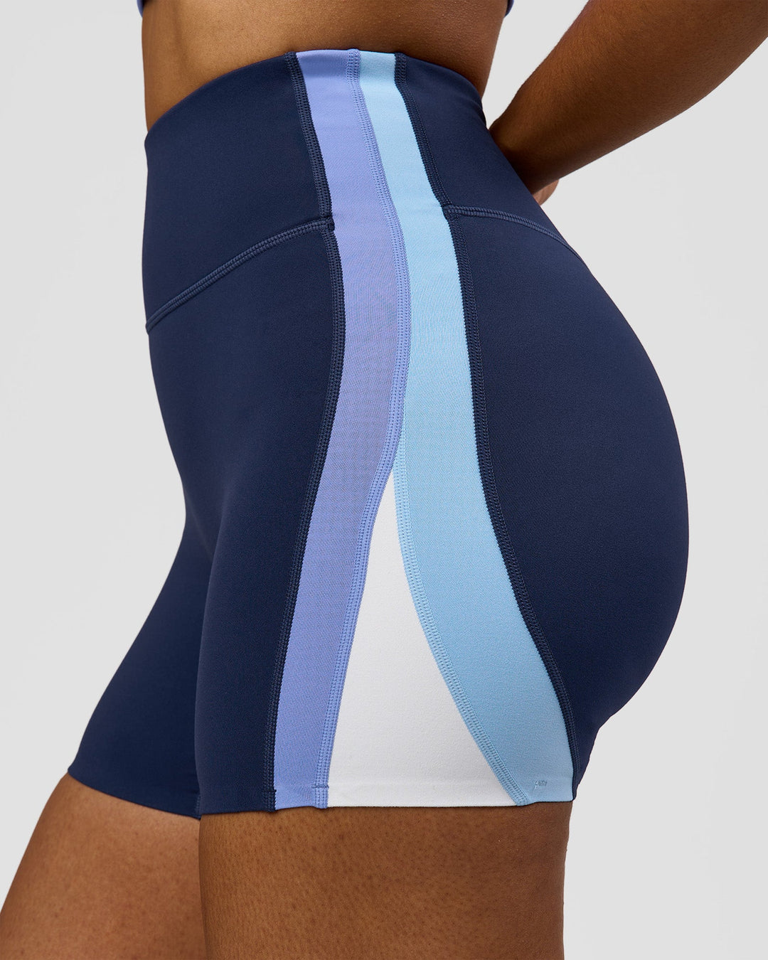 Woman wearing Revitalise Ultra High-Rise 4" Short - Future Navy - Bluebell | Model:Jordan | Size:S - view 1