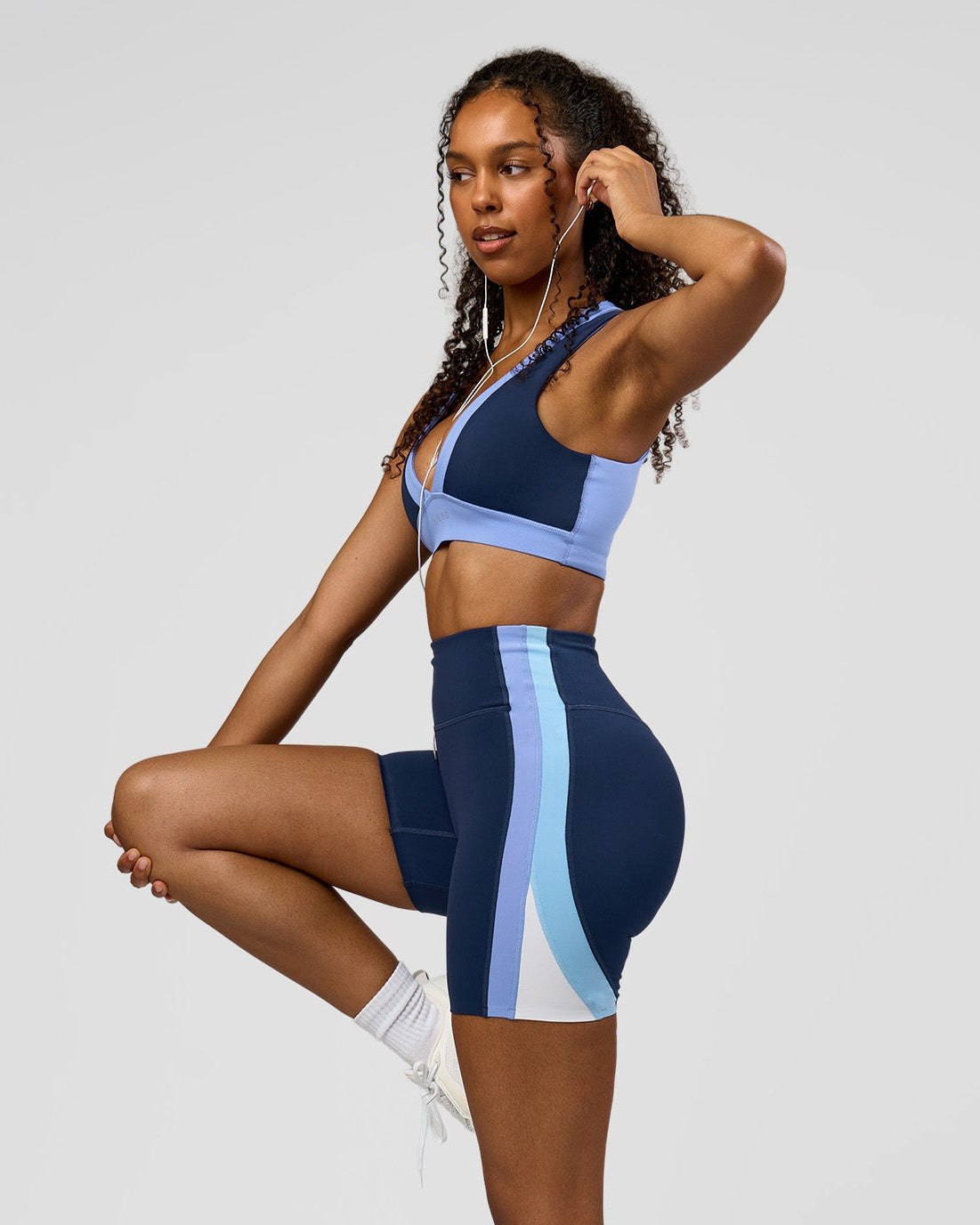 Woman wearing Revitalise Ultra High-Rise 6" Short - Future Navy-Bluebell | Model:Jordan | Size:S
