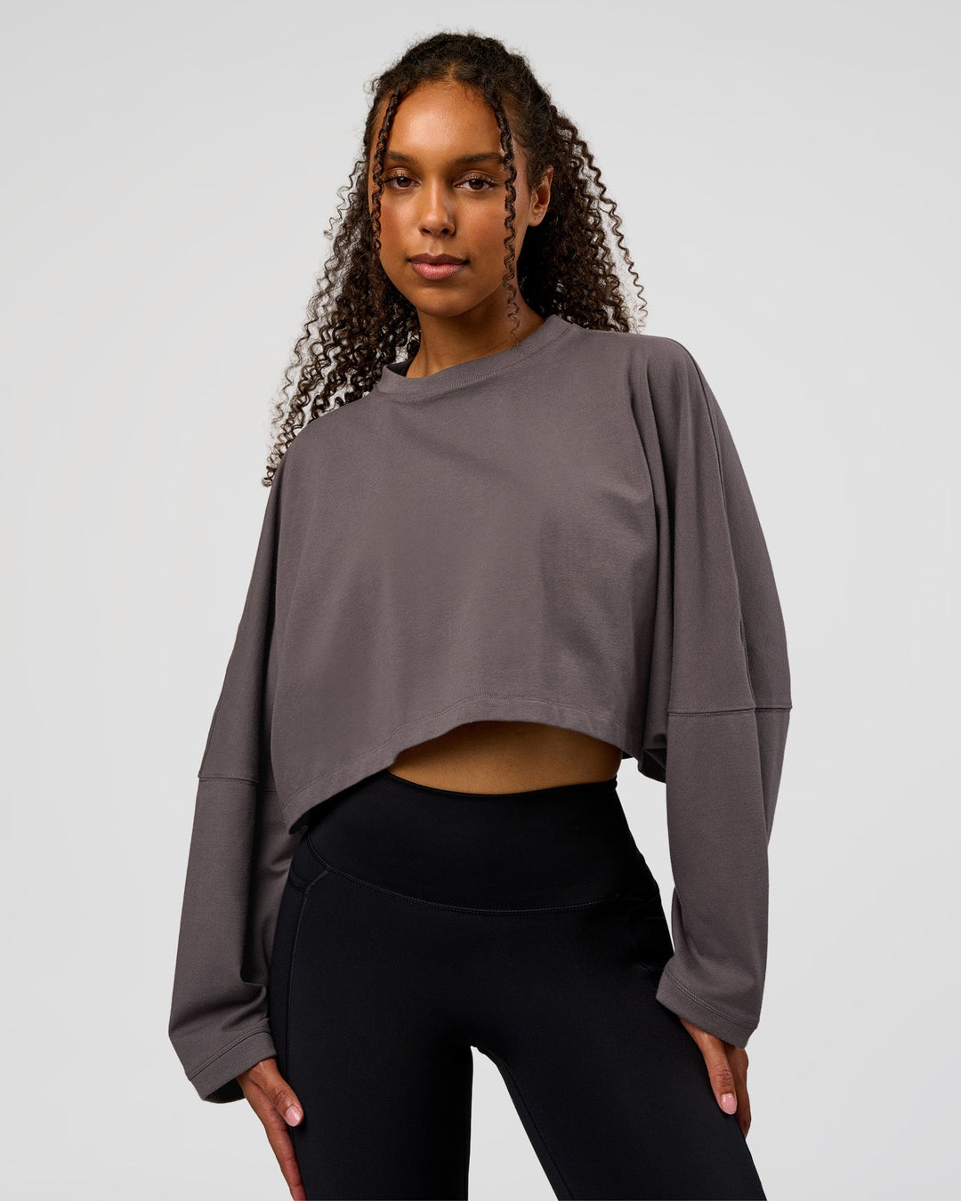 Woman wearing Street Surge Long Sleeve Tee - Duskstone | Model:Jordan | Size:S - view 1