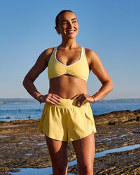 Woman wearing Luminous Sports Bra - Lemon-White | Model:Libby | Size:S | Thumbnail Index: 3