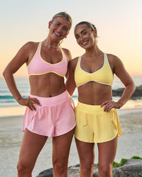 Woman wearing Luminous Sports Bra - Lemon-White | Model:Libby | Size:S | Thumbnail Index: 9