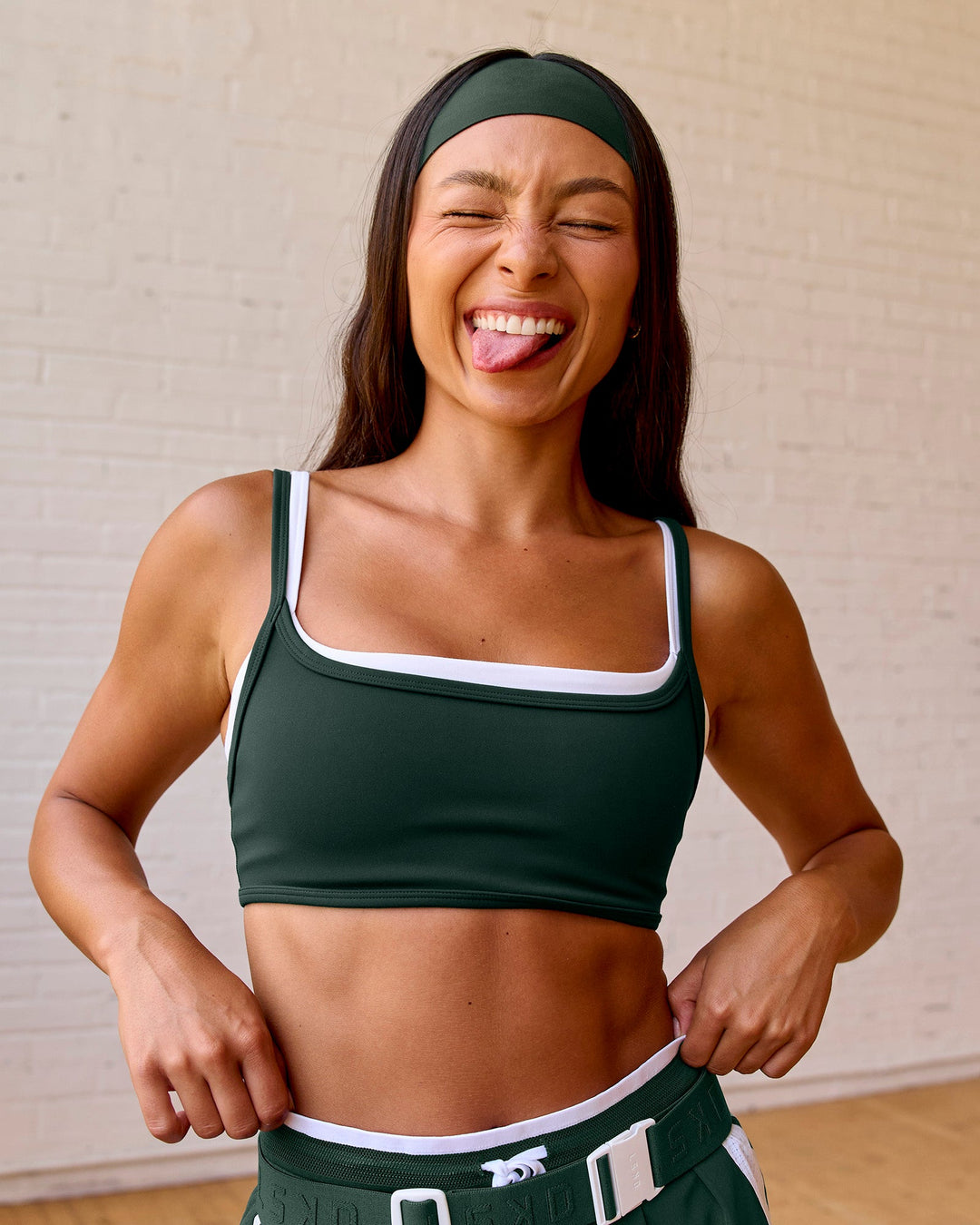 Woman wearing Balance Sports Bra - Midnight Green-White | Model:Meg | Size:S - view 3