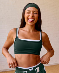 Woman wearing Balance Sports Bra - Midnight Green-White | Model:Meg | Size:S | Thumbnail Index: 2