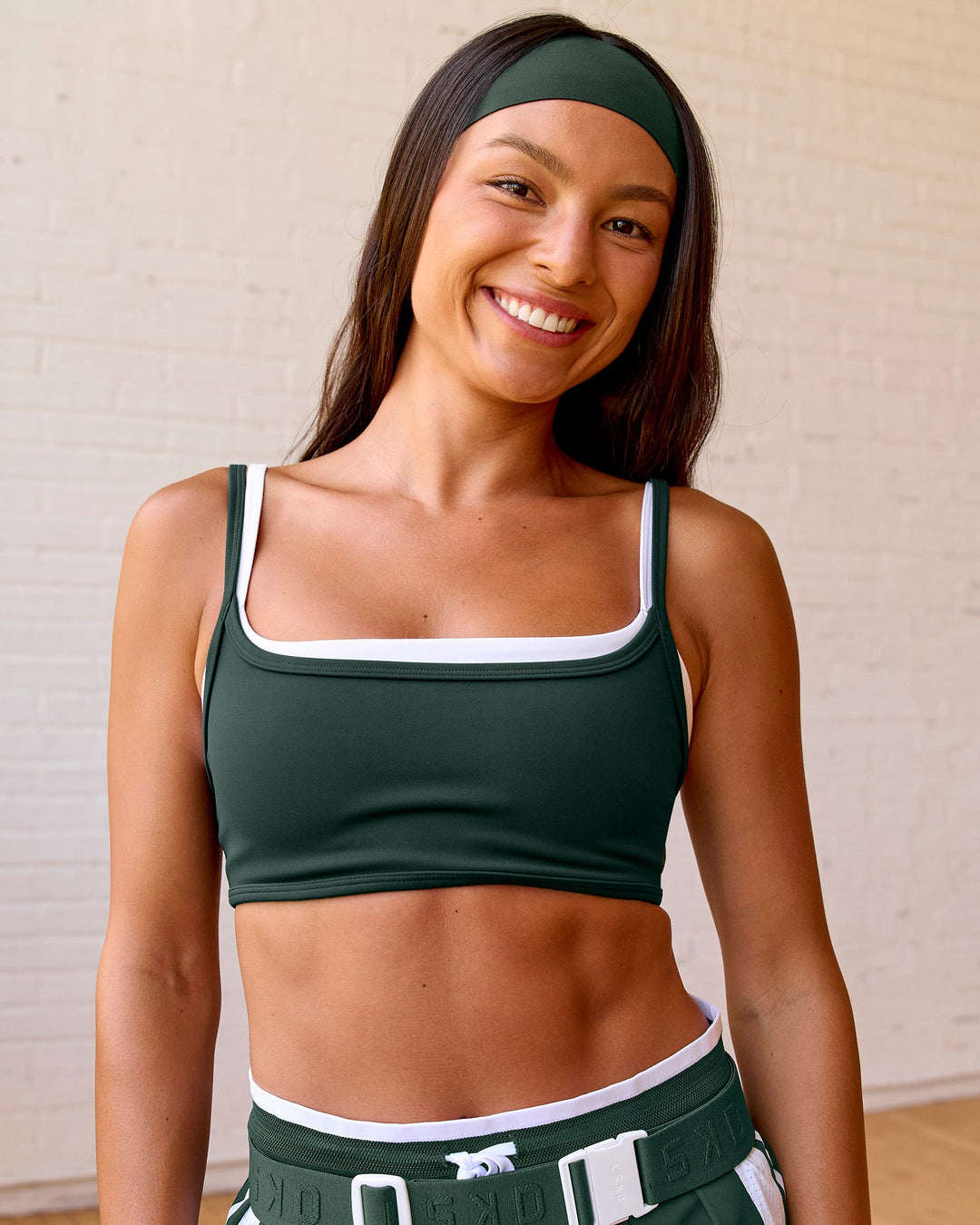 Woman wearing Balance Sports Bra - Midnight Green-White | Model:Meg | Size:S - view 7