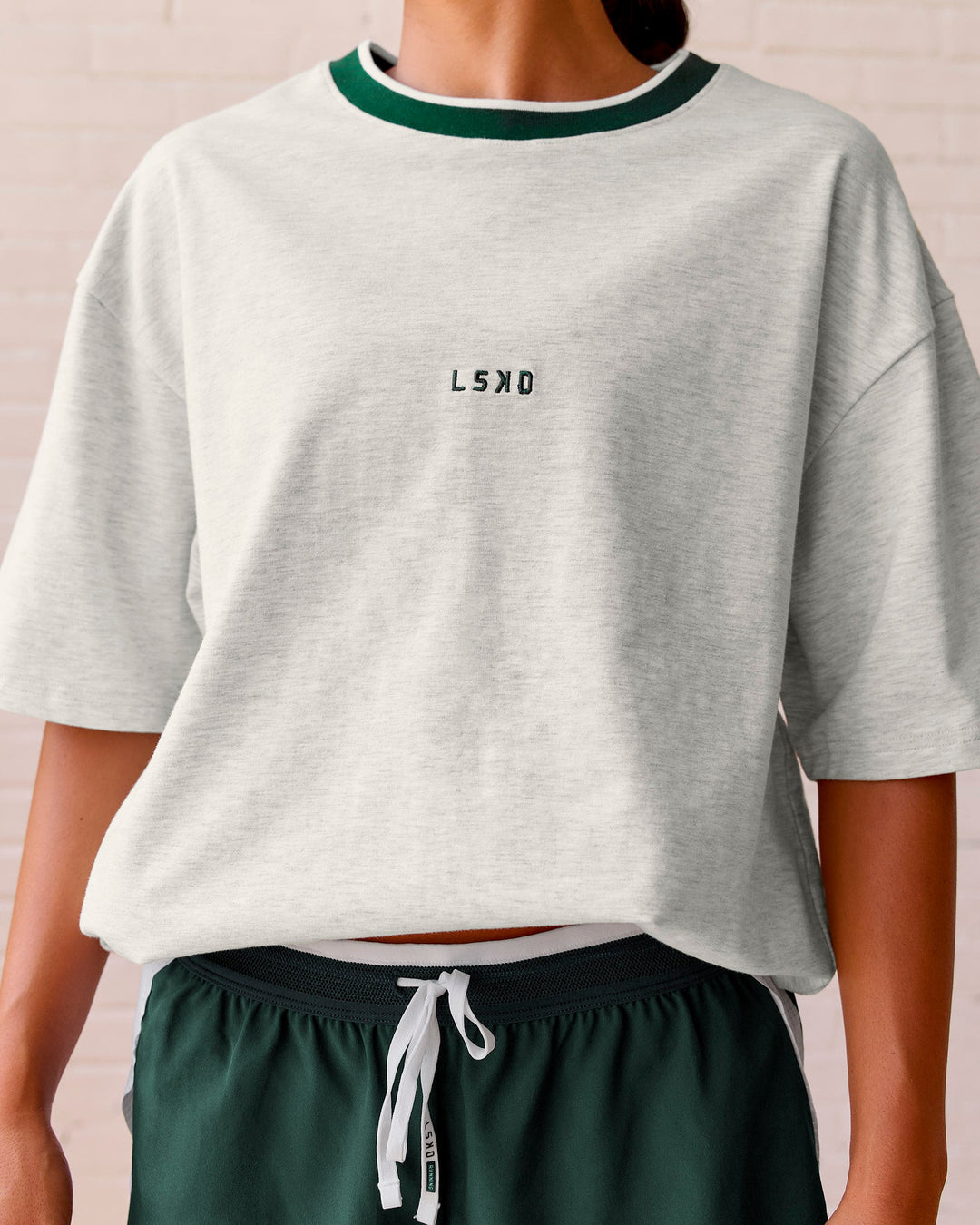Woman wearing Be Here Now Heavyweight FLXCotton Tee Oversize - Silver Marl-Midnight Green | Model:Meg | Size:S - view 12