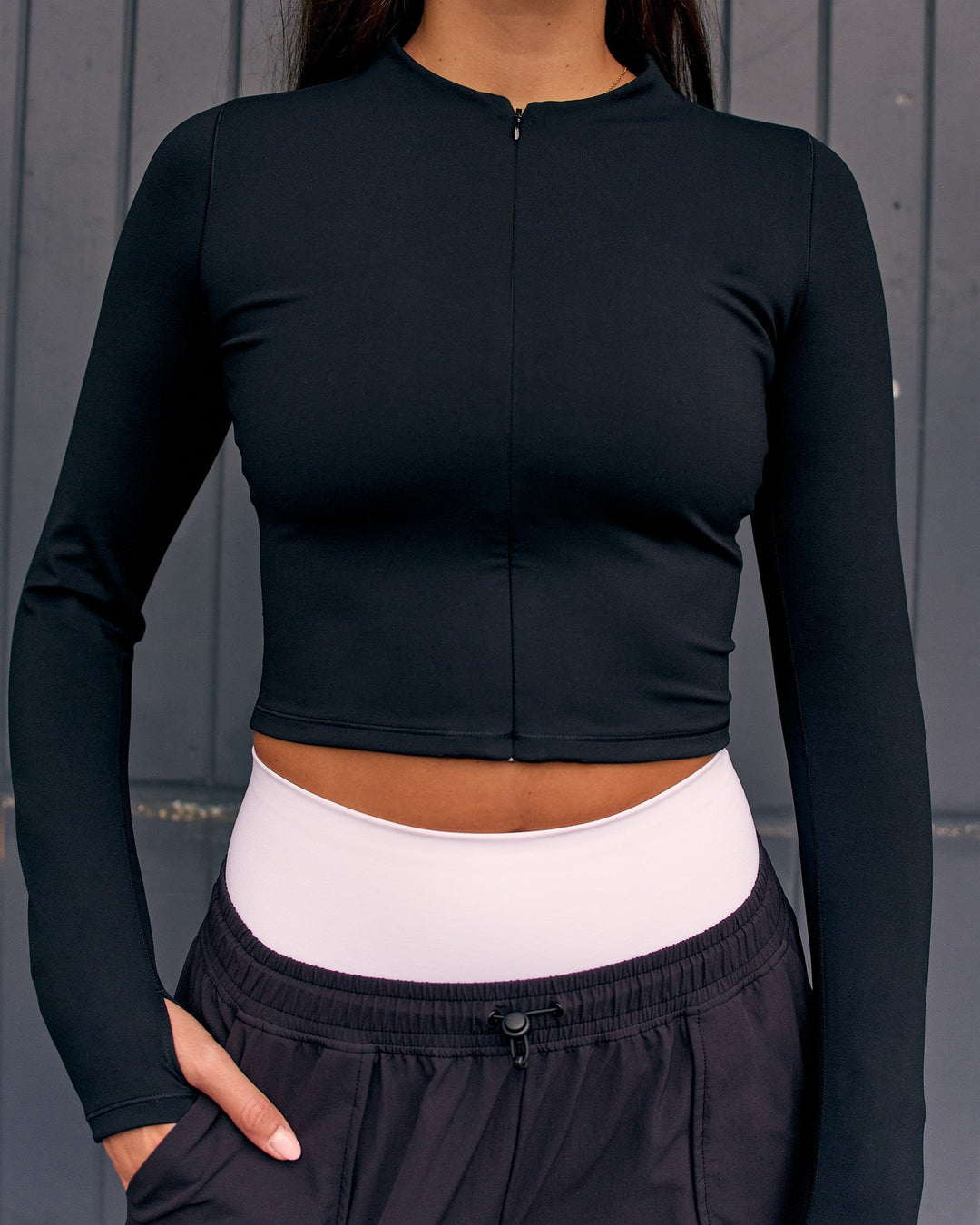 Woman wearing Sculpt Full Zip Long Sleeve Top - Black | Model:Remy | Size:S - view 2