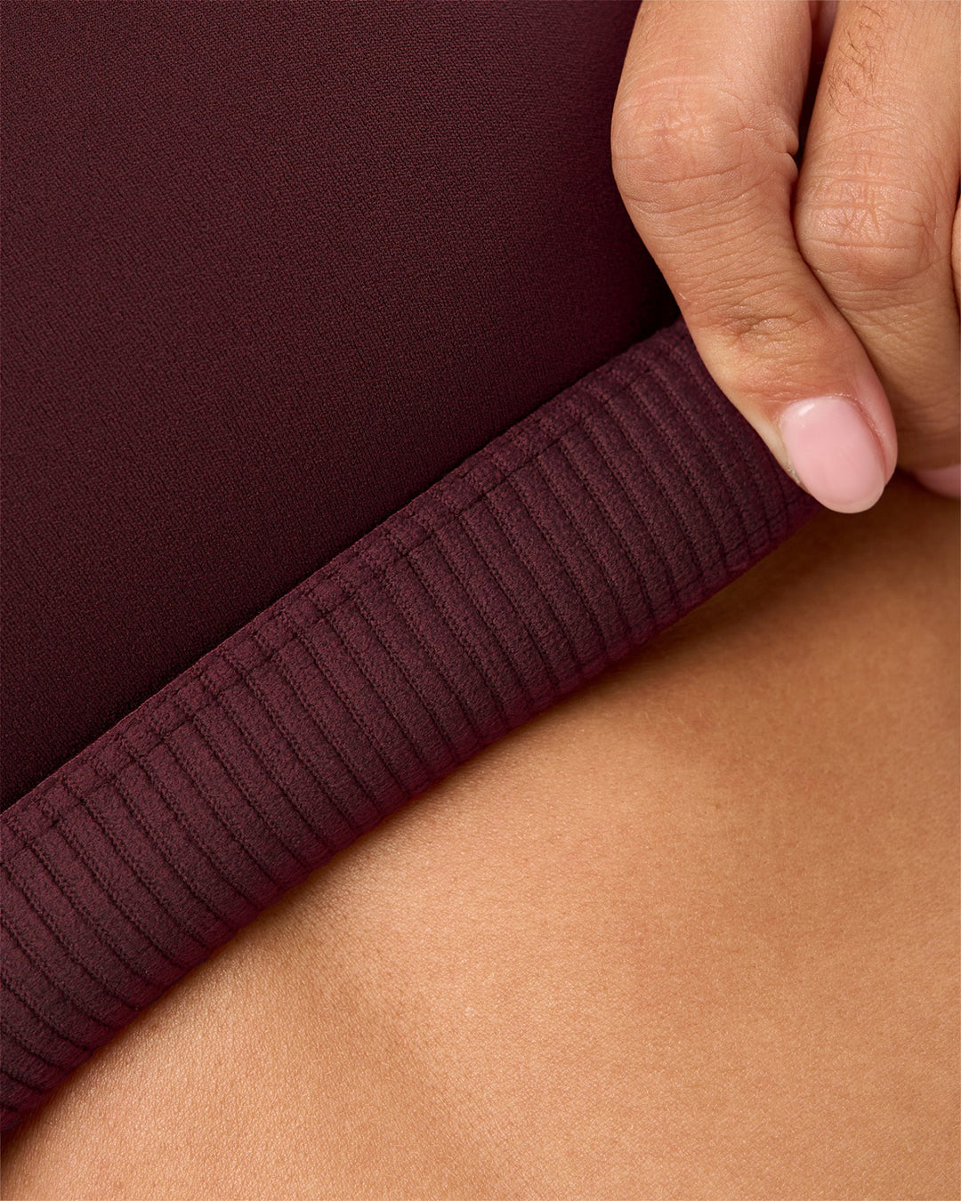 Woman wearing Twist Sports Bra D/DD/E - Cherry Lacquer | Model:Rhiley | Size:S - view 7