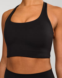 Woman wearing Flow Long Line Sports Bra - Black | Model:Rosie | Size:S | Thumbnail Index: 2