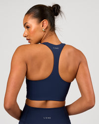 Woman wearing Flow Long Line Sports Bra - Future Navy | Model:Rosie | Size:S | Thumbnail Index: 3