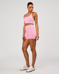 Woman wearing Flow Long Line Sports Bra - Pink Rose | Model:Rosie | Size:S | Thumbnail Index: 4