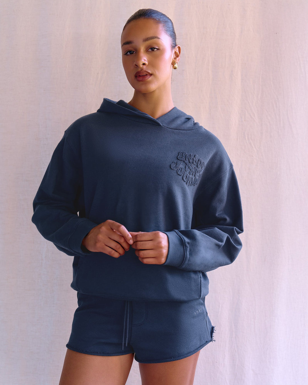 Woman wearing MVP Elite French Terry Hoodie - Future Navy | Model:Rosie | Size:S - view 2