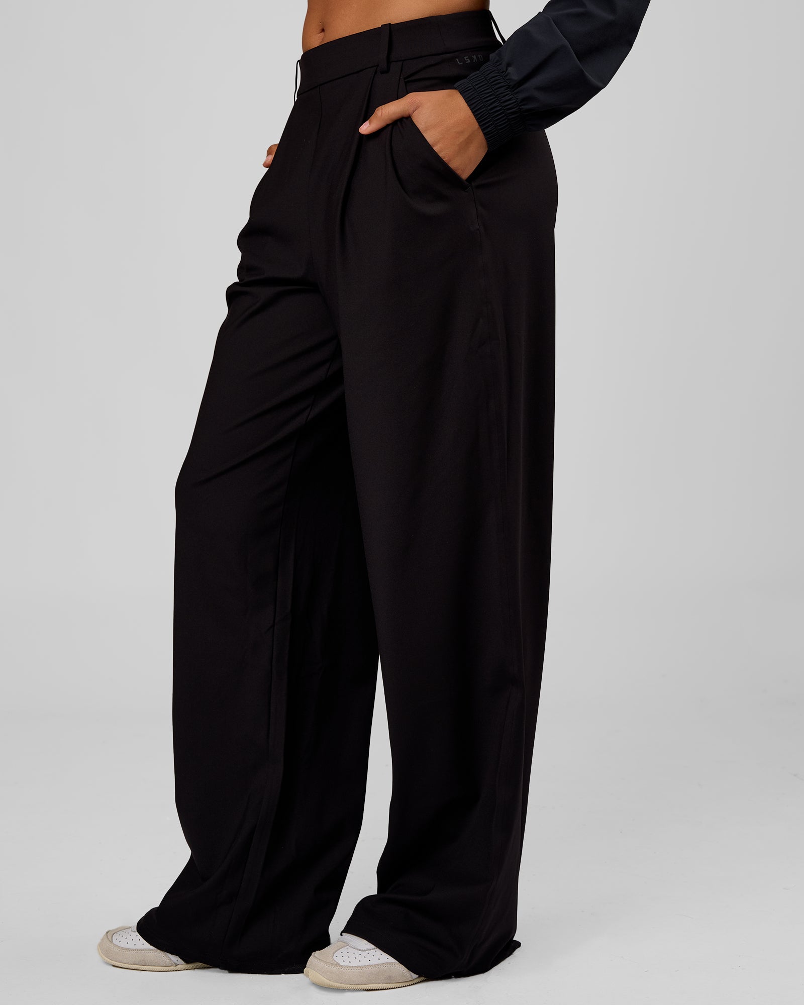 Woman wearing StretchShift Wide Leg Pant Tall - Black | Model:Rosie | Size:S