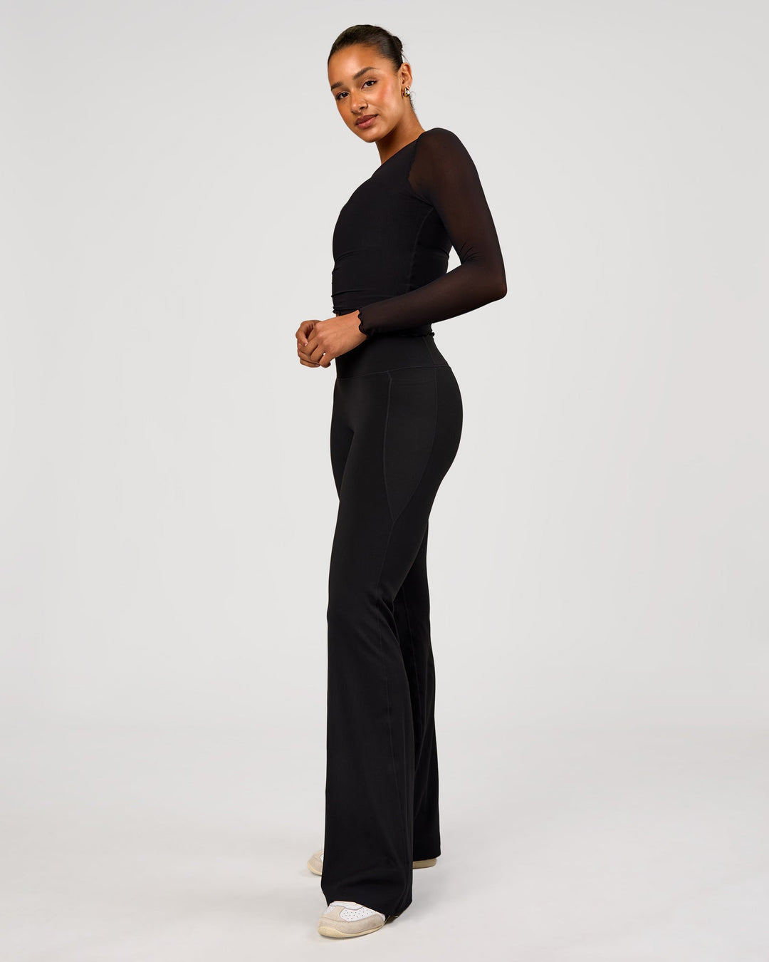 Woman wearing Studio Mesh Asymmetric Long Sleeve - Black | Model:Rosie | Size:S - view 4