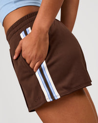 Woman wearing Urban Track Short - Hot Chocolate-Open Air | Model:Rosie | Size:S | Thumbnail Index: 1
