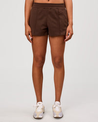 Woman wearing Urban Track Short - Hot Chocolate-Open Air | Model:Rosie | Size:S | Thumbnail Index: 2