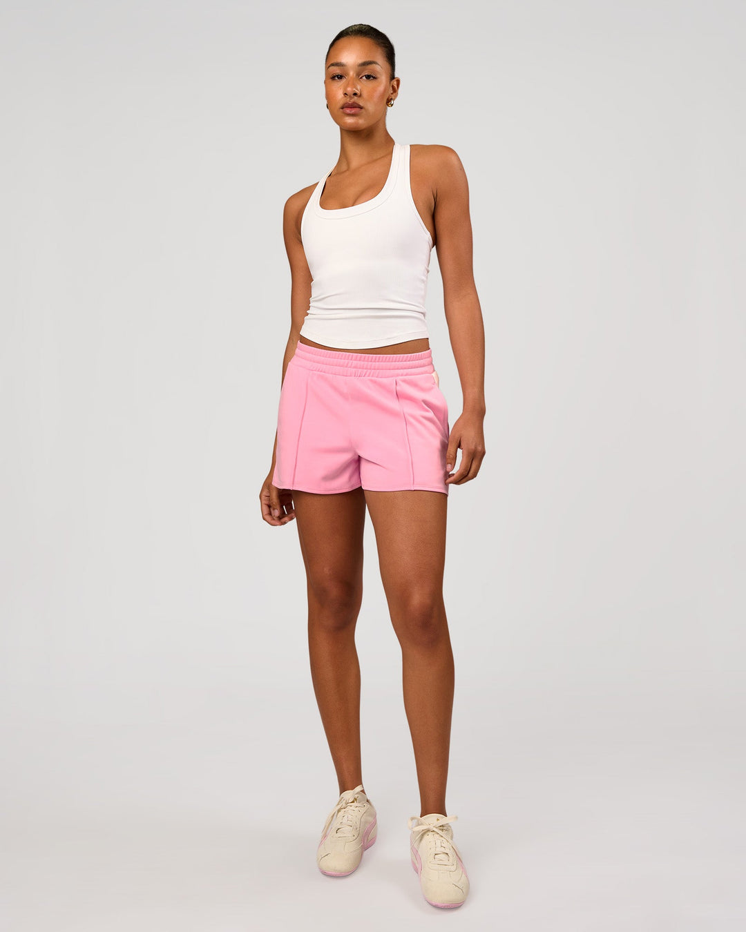 Woman wearing Urban Track Short - Pink Rose | Model:Rosie | Size:S - view 3