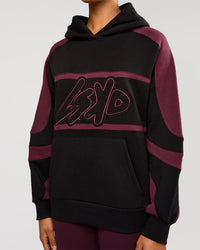 Woman wearing Vibe Oversized Hoodie - Black-Cherry Lacquer | Model:Rosie | Size:S | Thumbnail Index: 4