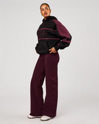 Woman wearing Vibe Oversized Hoodie - Black-Cherry Lacquer | Model:Rosie | Size:S | Thumbnail Index: 10