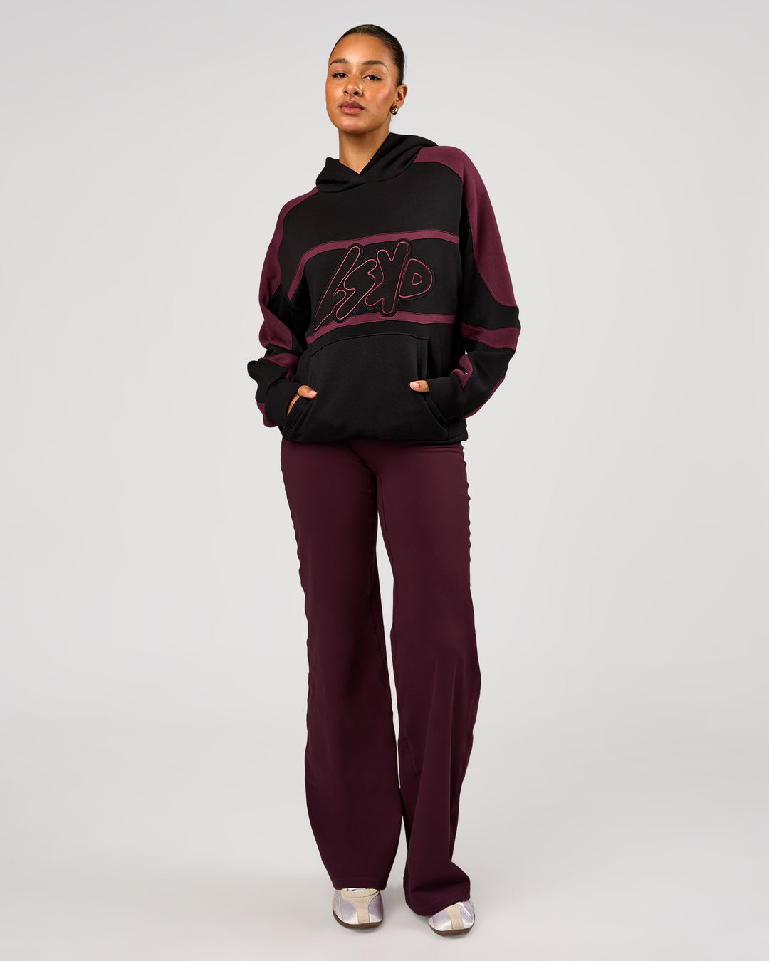 Woman wearing Vibe Oversized Hoodie - Black-Cherry Lacquer | Model:Rosie | Size:S - view 12