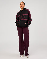 Woman wearing Vibe Oversized Hoodie - Black-Cherry Lacquer | Model:Rosie | Size:S | Thumbnail Index: 11